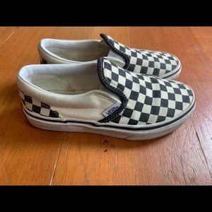 Kids black/white checkered vans. Worn about a dozen times. See photos. Size 1